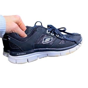 Kids size 13 black and white sketchers sneakers